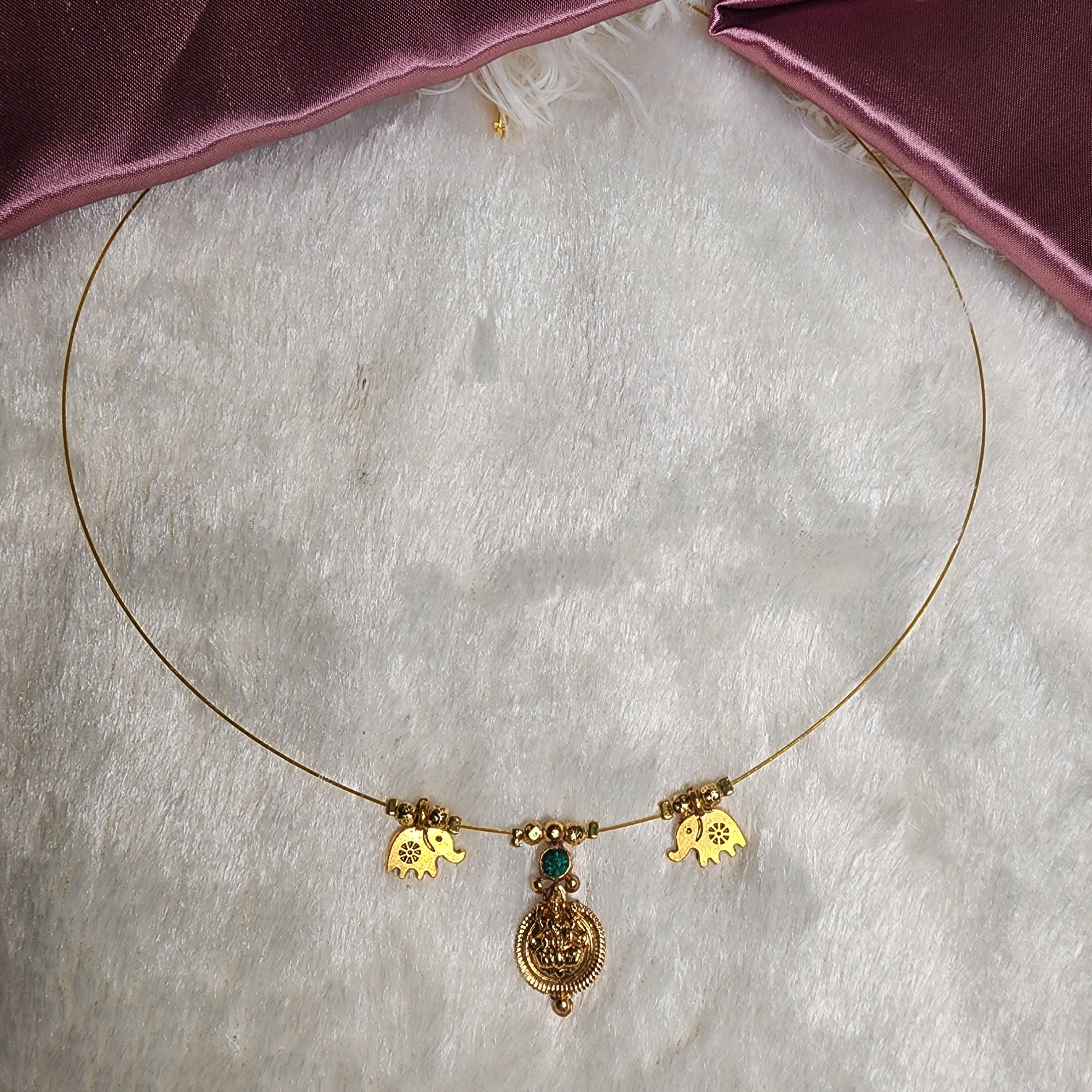 Lakshmi Kasu invisible necklace