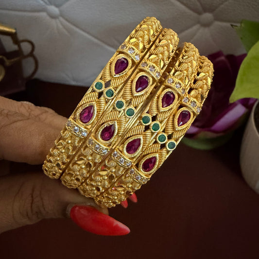 Ruby with gold Bangle